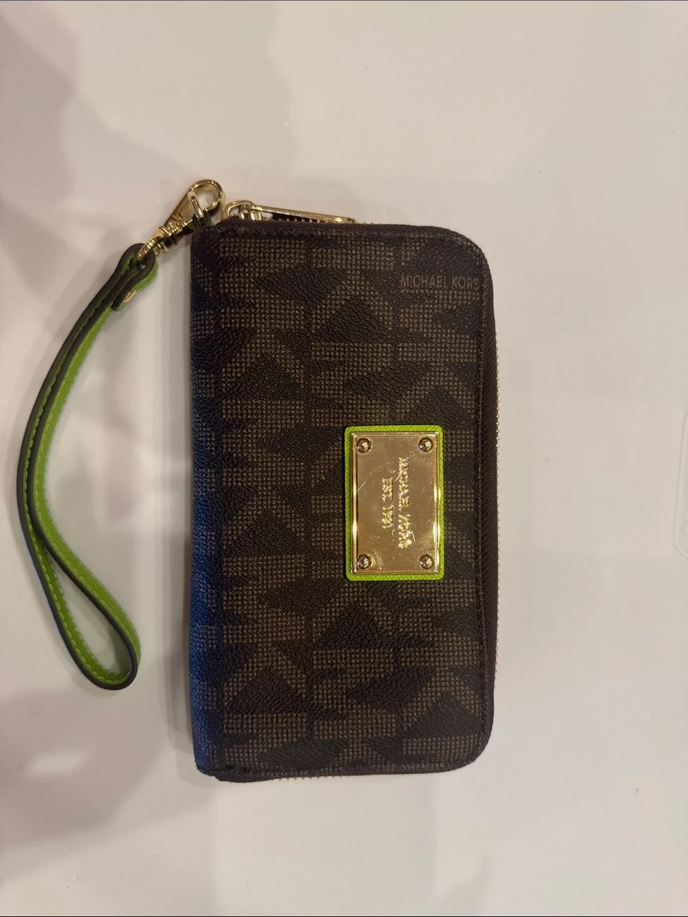 Michael Kors Brown Monogram Wristlet with Lime Accent